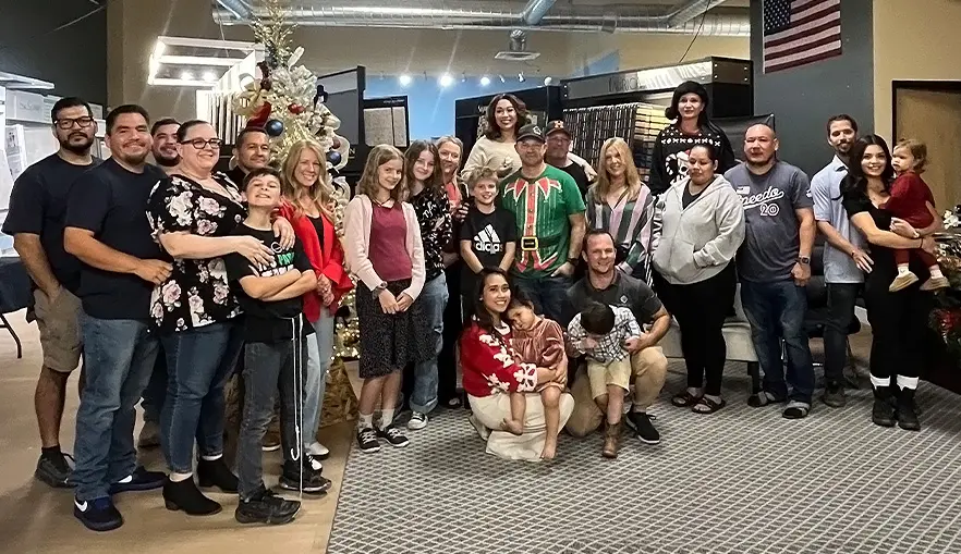 Vision Flooring Family Photo at Christmas Party